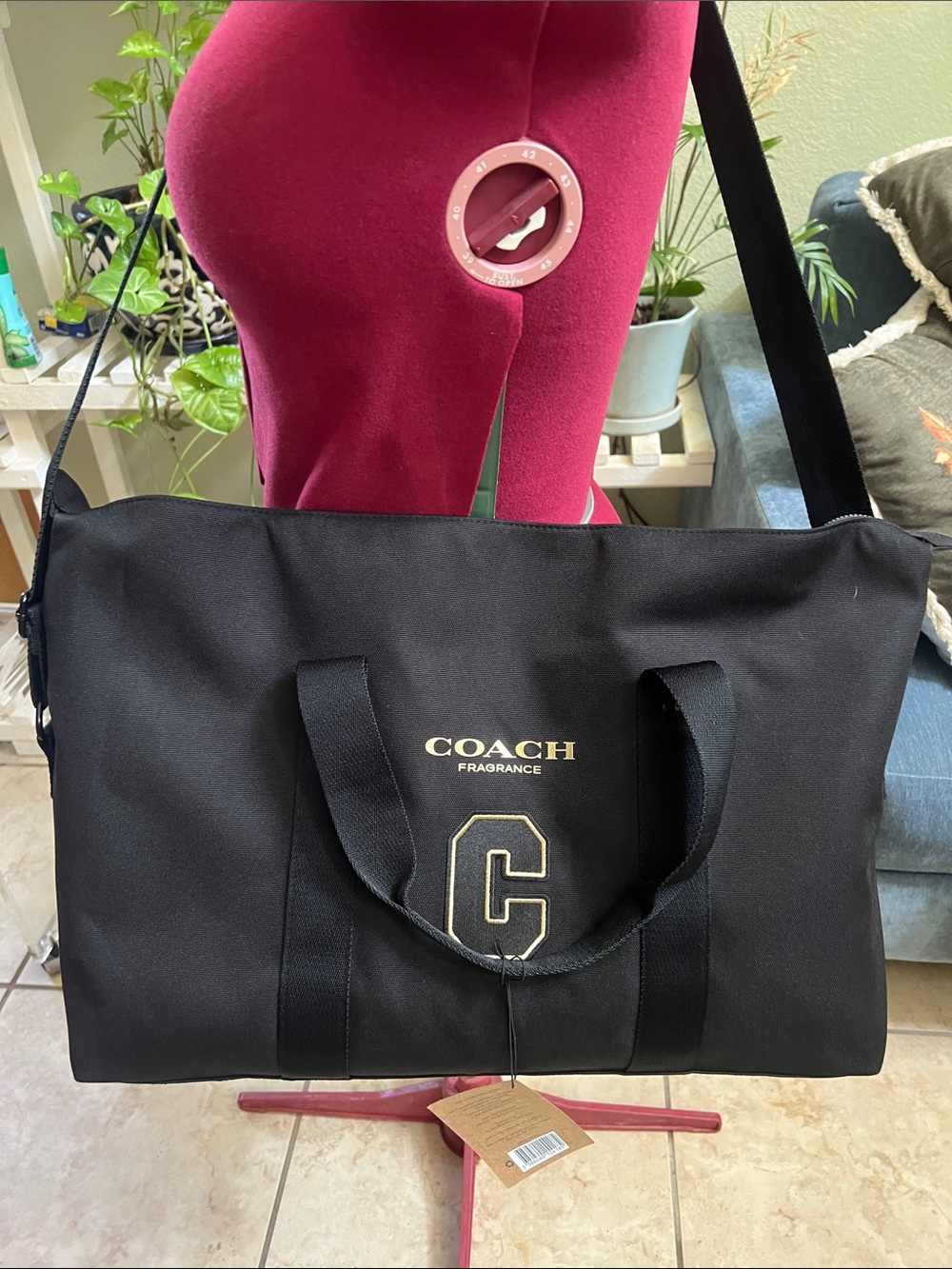 Coach Black Duffel Bag with Gold Logo